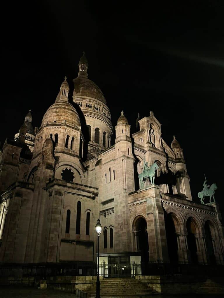 The 15 Best Places In France, Region By Region (An Honest Field Guide) 3 Night view of the Sacre-Coeur Basicilica in Paris. One of the best places in France for art and culture lovers.