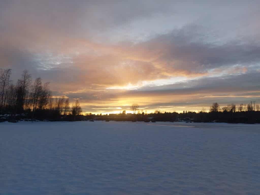 Kalix river sunset frozen river